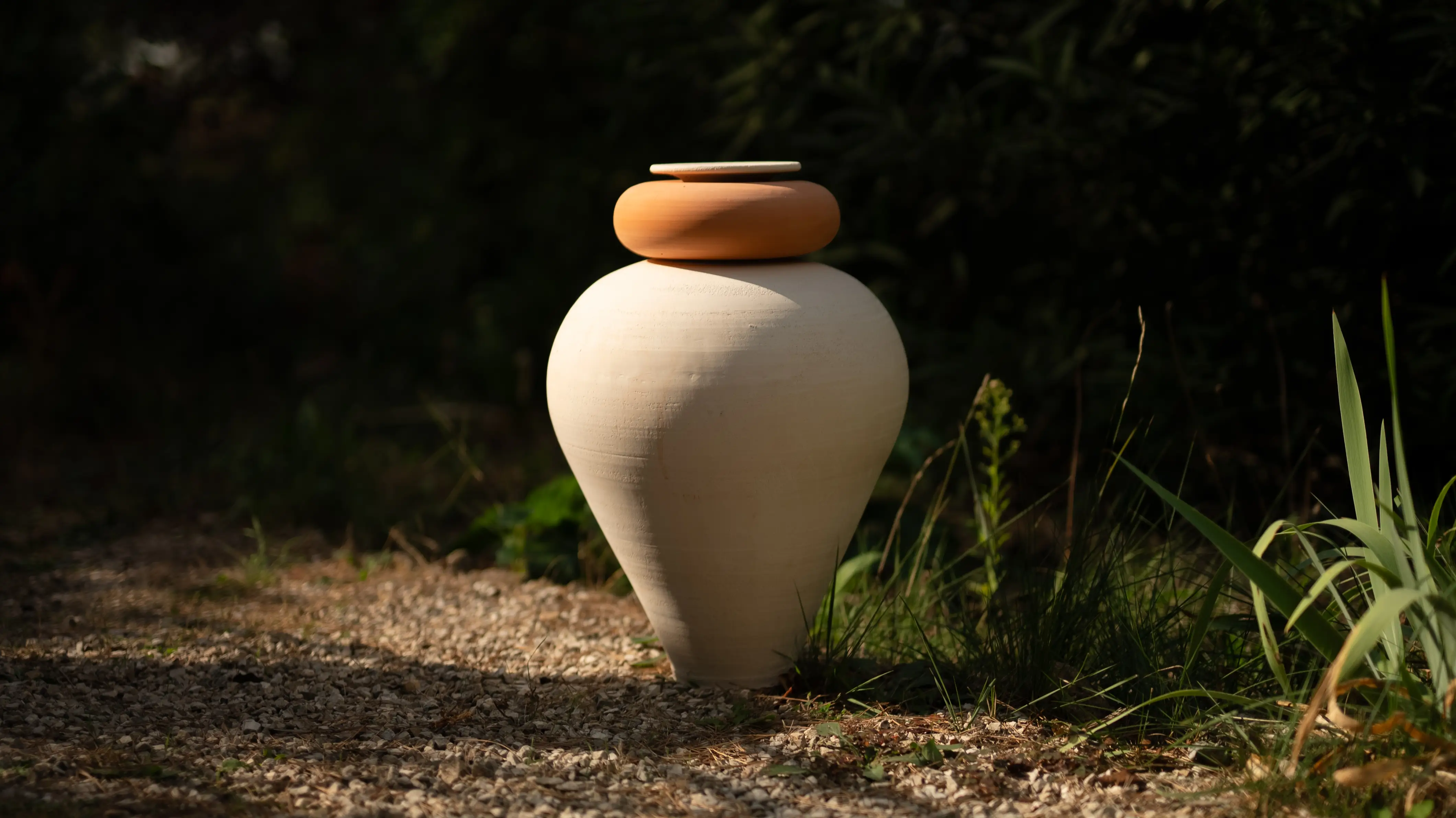 Sculptural terracotta jar integrated into a remarkable Mediterranean garden
