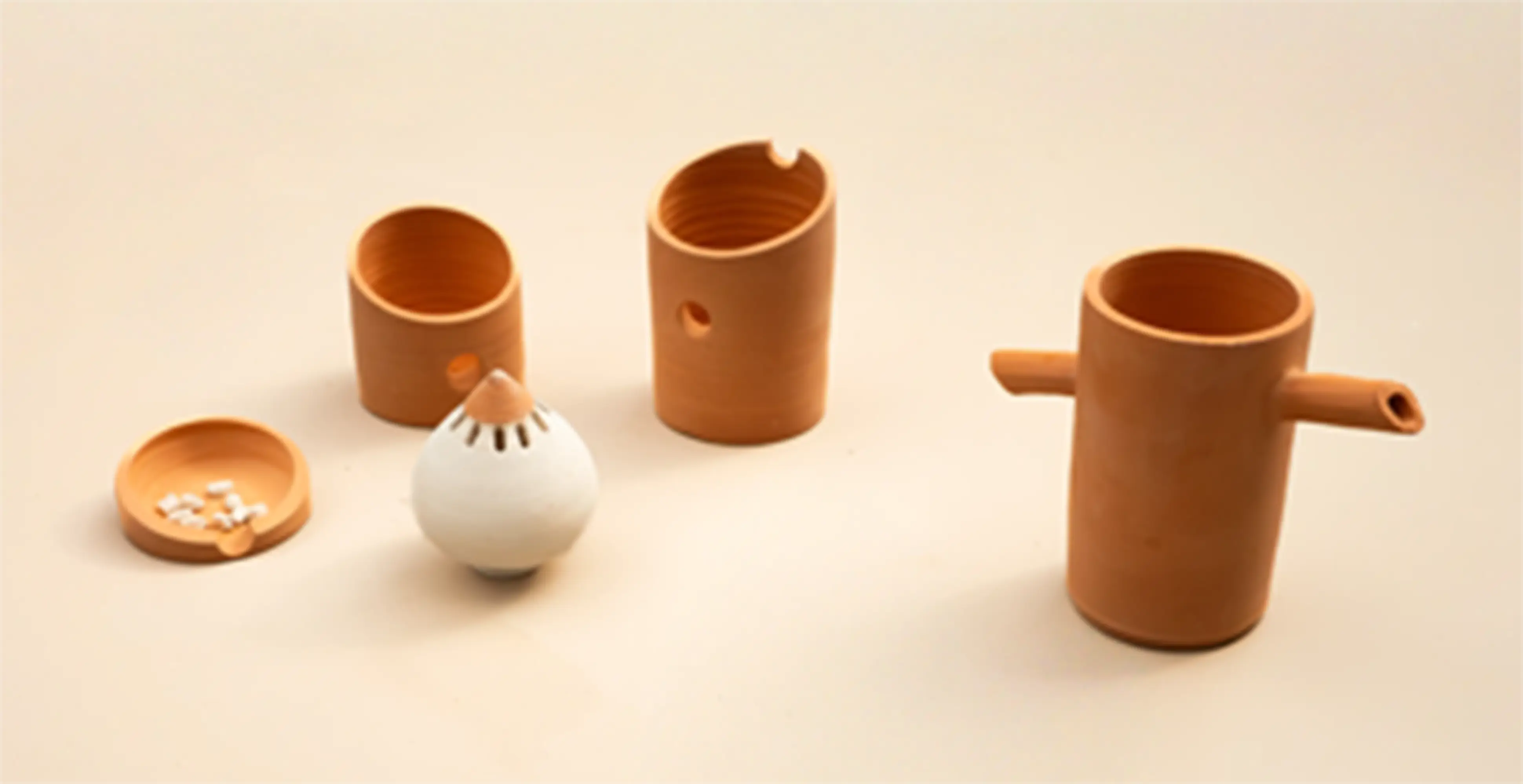 Satellites installation, terracotta jars forming an artistic constellation in the garden